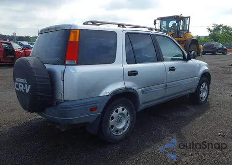 1999 Honda Cr-V Lx z USA, uszkodzony, nr VIN JHLRD1841XC024361